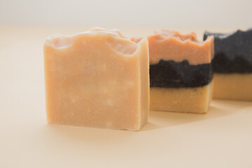 Line up of different hand made soap bar on the table