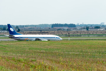 The plane is on the runway. Maintenance of the aircraft after an emergency landing. Preparing an airliner for takeoff.