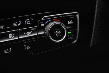 Control panel car air conditioner dashboard in a modern car.