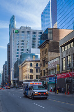 TORONTO, CANADA - APRIL 17, 2018:  Toronto Paramedic Services Ambulance Car In Motion On Yonge Street In The Financial District Of Downtown Toronto