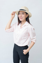 a joyful traveling woman is going on holiday on white background studio, travel and tourism concept