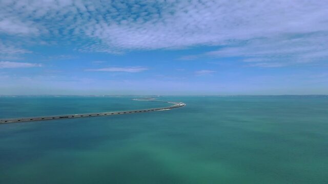 Aerial view of the Crimean(Kerch Strait Bridge) on summer sunny day. Bridge across the Kerch Strait, Black sea.