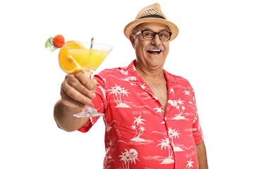 Mature man tourist toasting with a cocktail isolated on white background