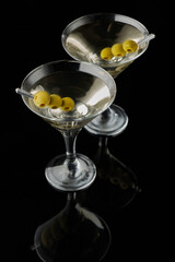 Martini vermouth drink isolated on black background