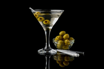Martini vermouth drink isolated on black background