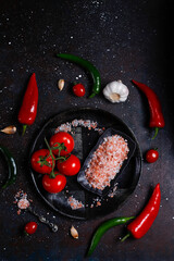 Himalaya salt in a dark background.