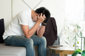 A mentally ill man in white clothes asian men