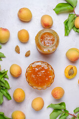 Apricot jam with fresh apricot fruits.