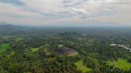 Aerial view of the Magnificent Borobudur temple. The world's largest Buddhist monument, in Central...