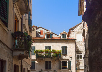 Fototapeta na wymiar Beautiful narrow street of old town. Kotor, Montenegro.