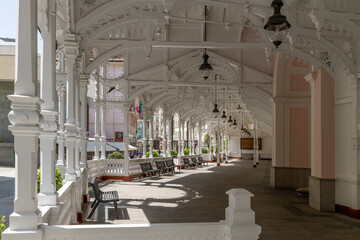 White wooden Market Colonnade in the center of famous Czech spa town Karlovy Vary (Karlsbad) -...