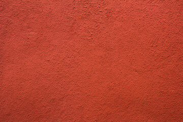 Natural background. Red or terracotta concrete wall. Copy space.