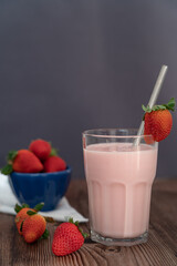 Red strawberries on the wooden table