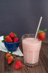Red strawberries on the wooden table