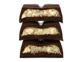 Stack of chocolate pieces with marzipan filling, close-up