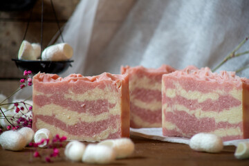 Photos of handmade natural soap with silk and cherry aroma
