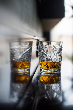 Whisky glass on a wooden surface