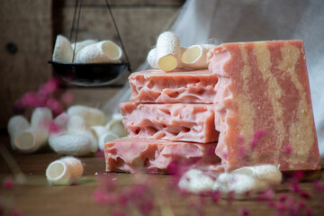 Photos of handmade natural soap with silk and cherry aroma