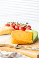 Block of hard cheese with chili and wasabi flavor.