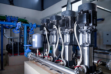 Industrial interior of water pump, valves, pressure gauges