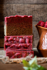 Photos of handmade natural soap with raspberry puree