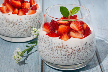 Dessert made of lactose-free milk with chia seeds and strawberries