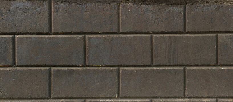 Big concrete blocks wall texture. Panorama. Old cinder blocks