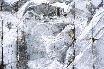 Texture of a marble wall with cracks and wavy patterns. Concept background, texture, nature