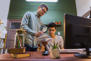 private teacher explaining to a student at home