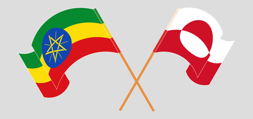 Crossed and waving flags of Ethiopia and Greenland