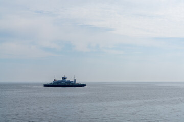 view of the Langeland Ferry crossing the open ocean from Langeland Island to Lolland Island in Denmark
