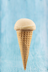 Tasty vanilla ice cream cone.
