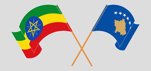 Crossed and waving flags of Ethiopia and Kosovo