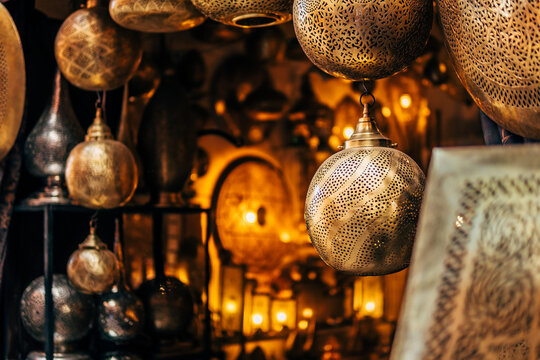 Golden beautiful lams in street shop
