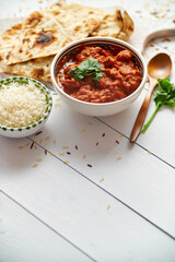 Fresh and tasty Chicken tikka masala served in ceramic bowl