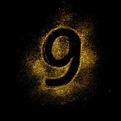 Letters of golden glitter sparkle on black background