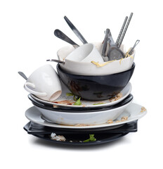 Dirty dishes pile needing washing isolated on white background