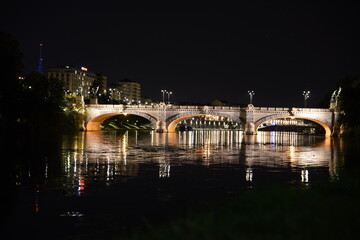 The bridges of river Po at night