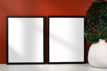 On trend shadow photography blank frame mockup featuring new season background color, tan brown. Negative copy space.