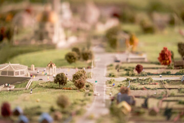 a miniature of a small village and a road. Miniature of trees and bushes