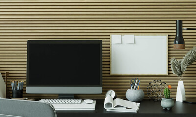 A working room with a computer placed on the table