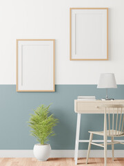 Living room decorated with chairs, Picture Frames and Small Plant Pots