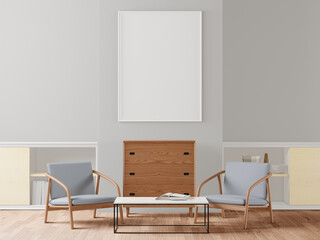 The living room is decorated with a storage table. Chair and picture frame on the wall