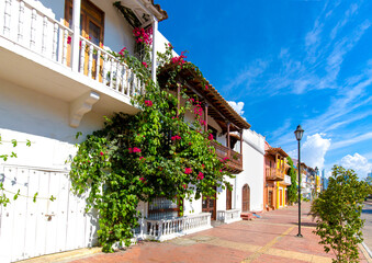 Fototapeta na wymiar Colombia, Scenic colorful streets of Cartagena in historic Getsemani district near Walled City, Ciudad Amurallada, a UNESCO world heritage site.