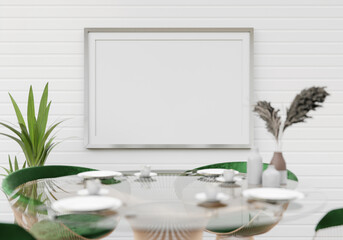 Picture frames with plant pots adorn the living room.