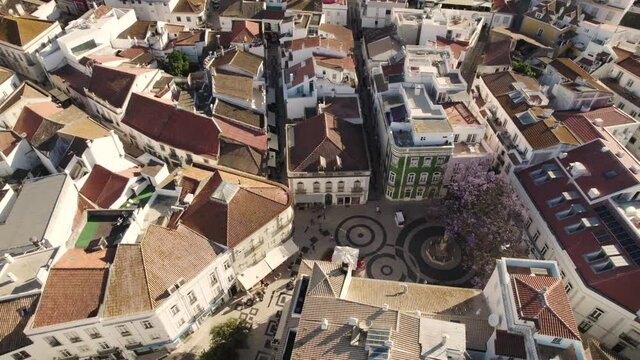 Overhead aerial top down view traditional square with narrow streets in Lagos, Algarve