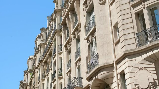 Typical Parisian Building With Balconies And Windows. Haussmann Style Architecture Along 16th Arrondissement In Paris, France. low angle, side view