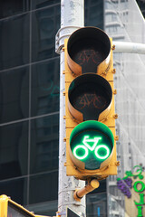 New York bike traffic green sign light in the city Close up.