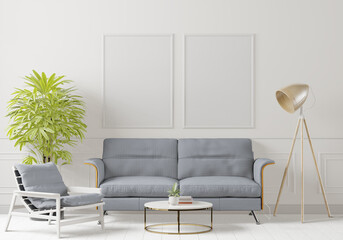 The living room consists of a sofa chair and a picture frame on the wall.