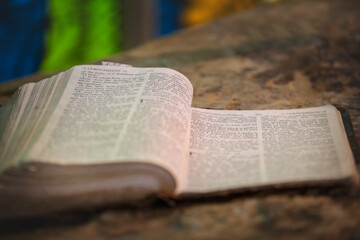 Fototapeta premium Open Bible page reading the Word of God
